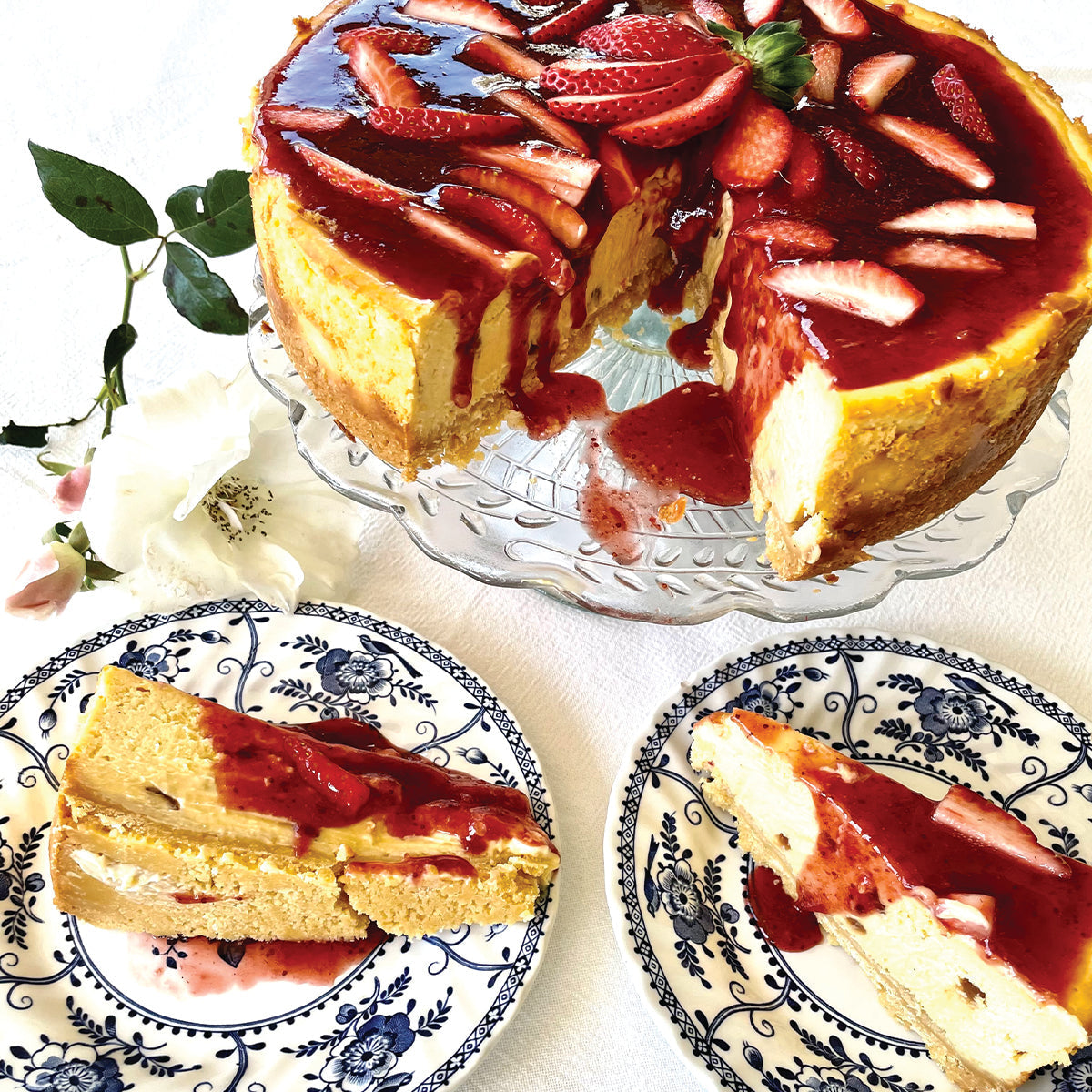 Wedgewood Nougat Strawberry and White Belgian Cheesecake with a Champagne Strawberry Sauce.